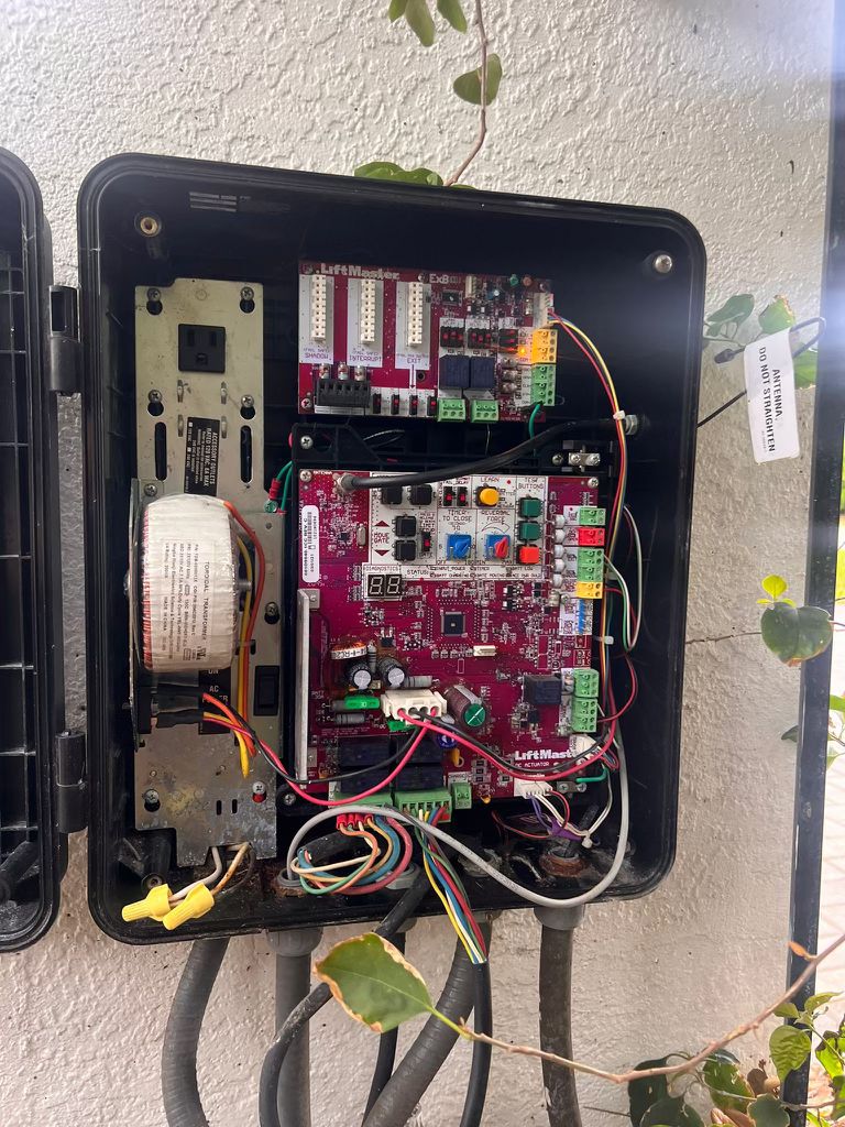 Gate opener control box with circuit boards and wiring in Santa Monica, CA